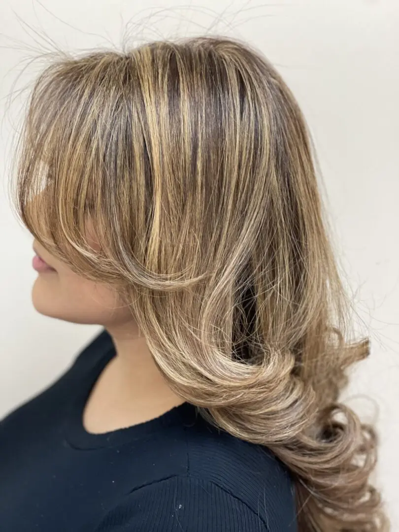 shiny golden hair color of a woman