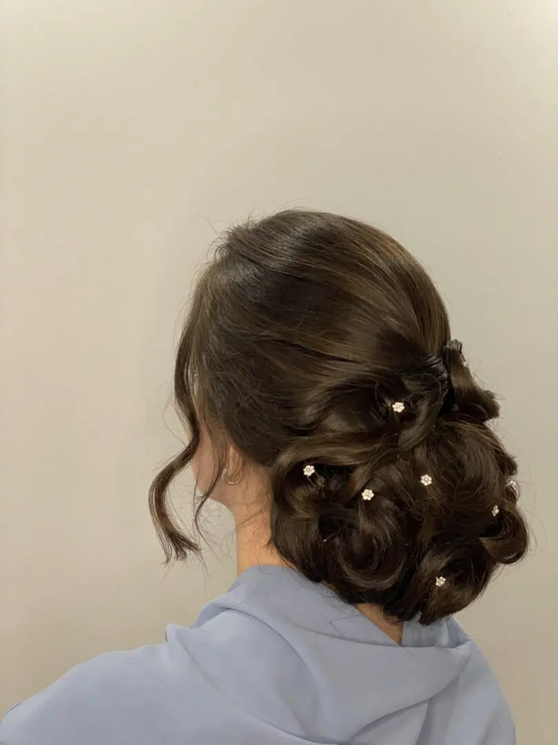 A picture of a stylish hair bun with hair pins